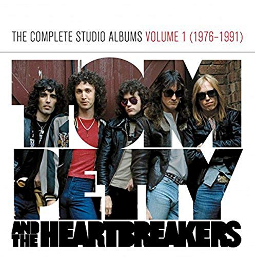 Tom Petty and The Heartbreakers album cover with band photo.