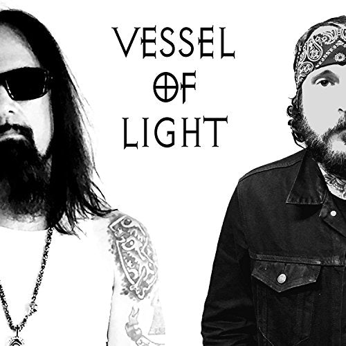 Black and white portrait of two bearded men with tattoos, album title above.