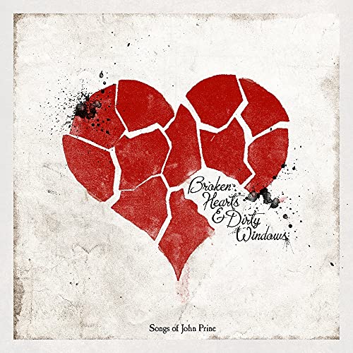 CD cover with a fragmented red heart and distressed texture.