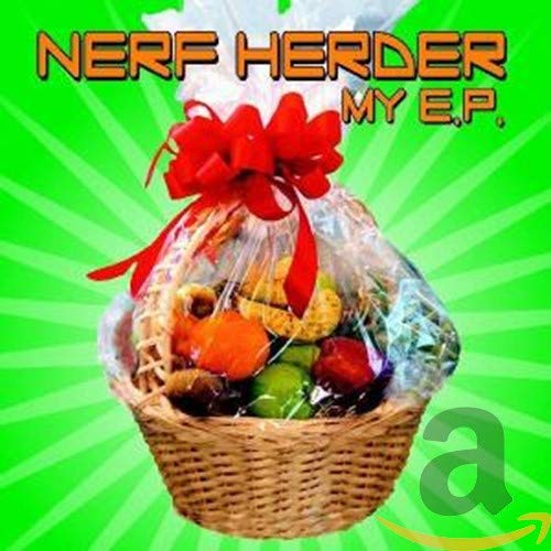 Gift basket with fruit and a red bow, album title above.