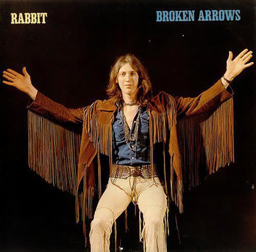 Album cover featuring a man with long hair in a fringed jacket.