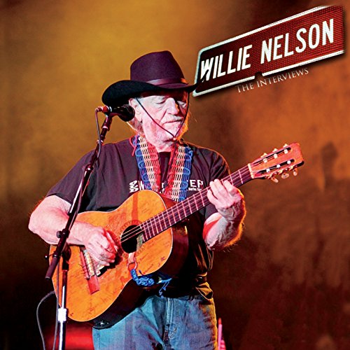 Willie Nelson playing an acoustic guitar on stage, album cover.