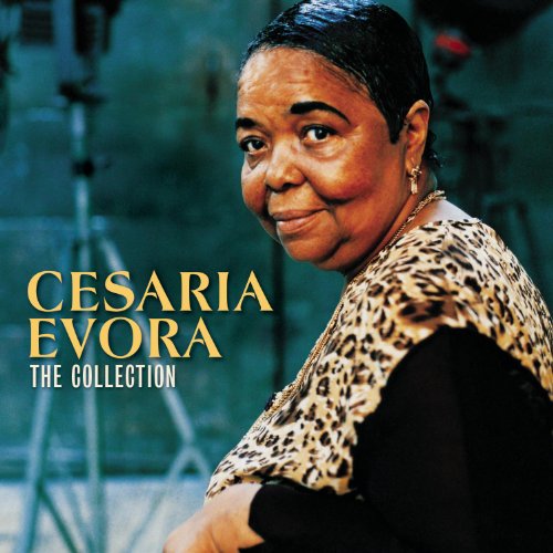Portrait of Cesaria Evora, a smiling woman in a patterned top.