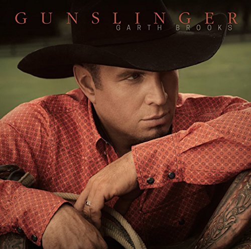 Garth Brooks wearing a black cowboy hat and red patterned shirt on album cover.