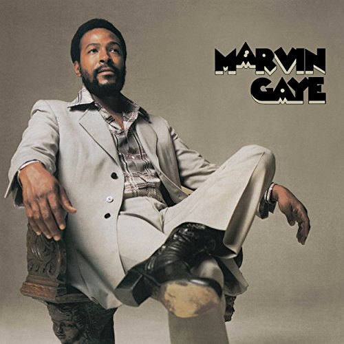 Marvin Gaye portrait on album cover, seated in grey suit and boots.