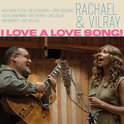 CD cover featuring a man playing guitar and a woman singing into a microphone.