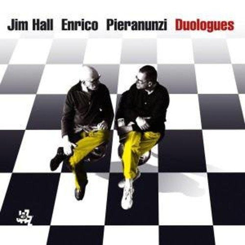 CD cover: two musicians seated on a black and white checkered floor.