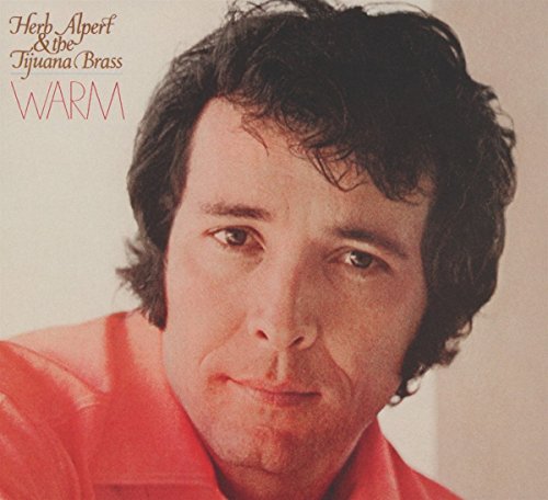Herb Alpert & the Tijuana Brass album cover, “Warm”, featuring a portrait.