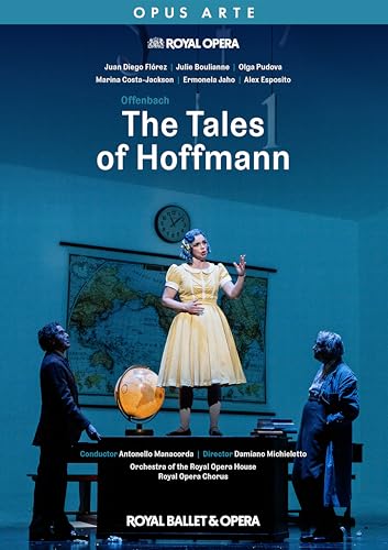 Blu-ray cover showing three opera singers on stage with a map and globe.
