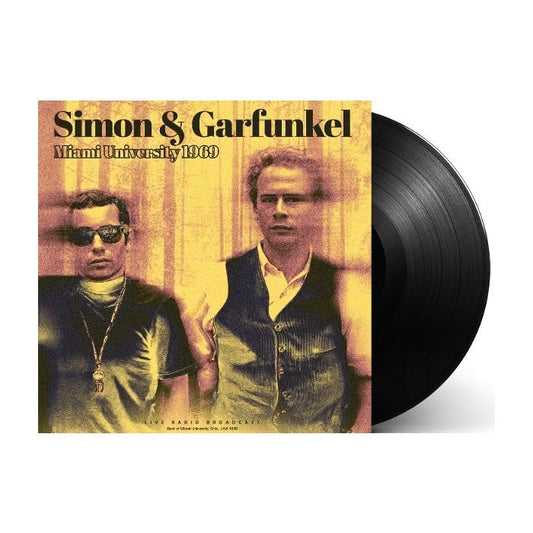 Simon & Garfunkel vinyl record cover with duo portrait, black disc visible.