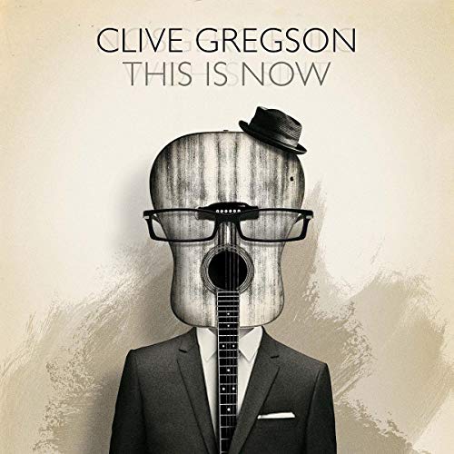 CD cover: a man with a guitar for a head, wearing a suit.