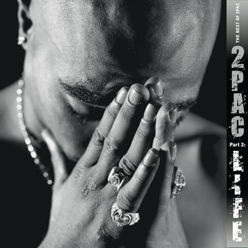 2Pac album cover featuring a close-up of the artist with hands clasped.