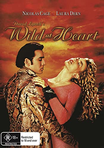 DVD cover for "Wild at Heart" featuring Nicolas Cage and Laura Dern.