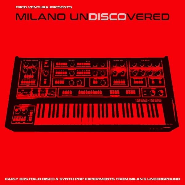 Red album cover featuring a black synthesizer keyboard and bold text.