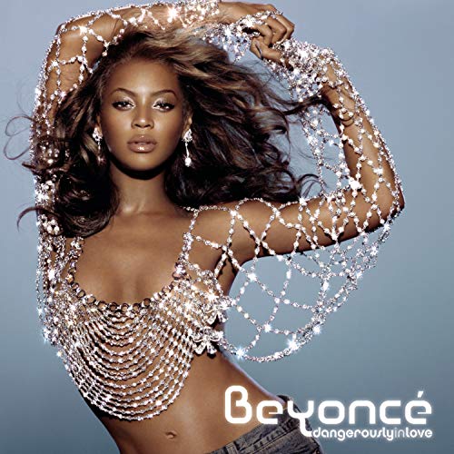 Beyoncé in a shimmering, jeweled top on the "Dangerously in Love" album cover.