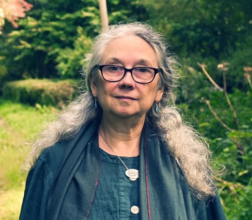 Smiling at Grief in a House in a Forest Where Life Grows