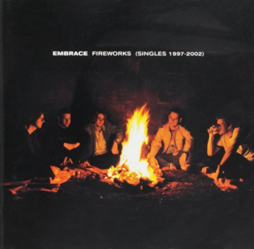 Embrace album cover: band members around a campfire, dark background.