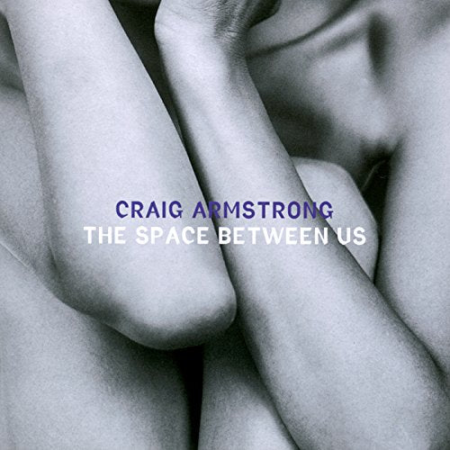 CD cover for Craig Armstrong’s “The Space Between Us” with embracing figures.