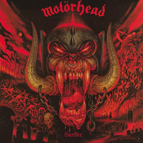 Motorhead’s “Sacrifice” vinyl cover: demonic face with horns in a red, fiery scene.