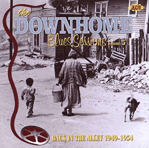 CD cover: black and white photo of people and a dog in an alley.