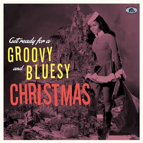 CD cover featuring a woman with gifts and a Christmas tree.