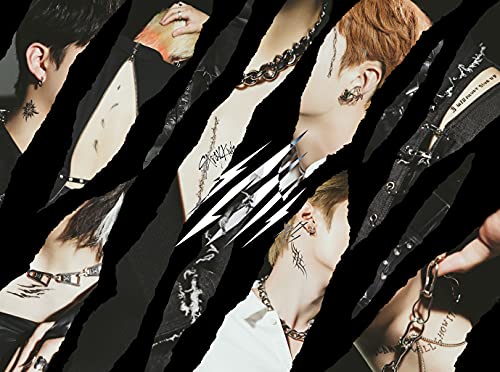 Stray Kids members with edgy styling and torn black background.