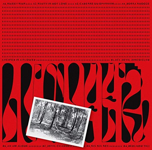 CD cover: black and red abstract shapes with a forest photograph.