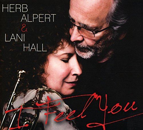Herb Alpert and Lani Hall album cover, close-up portrait with trumpet.