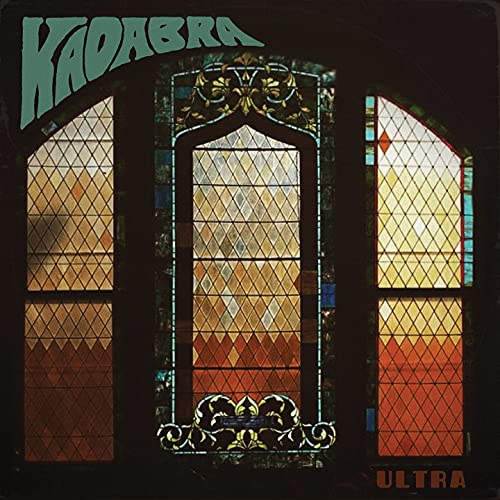 Vinyl record cover featuring a stained-glass window design.