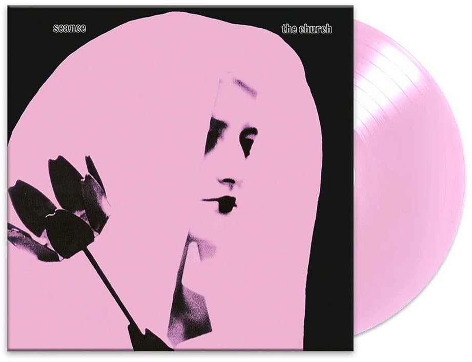 Pink vinyl record of The Church’s “Seance” with a ghostly face cover.