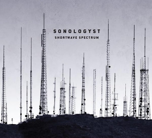 CD cover: many radio transmission towers against a pale sky.