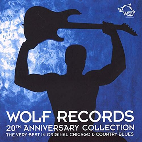 CD cover: Silhouette of guitarist against a blue, smoky background.