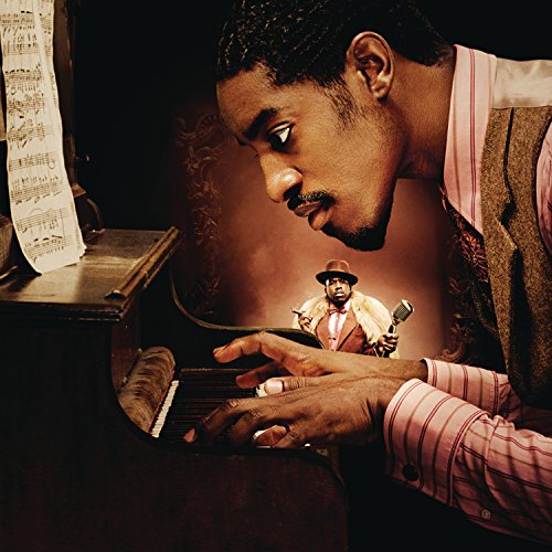 Outkast’s “Idlewild” CD cover: André 3000 at a piano, Big Boi in background.