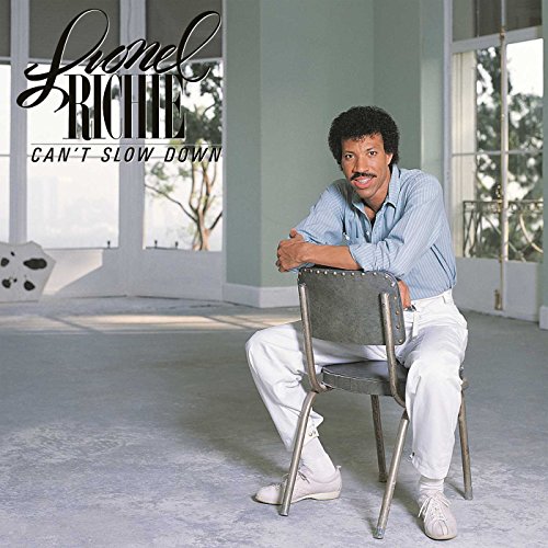 Lionel Richie album cover, "Can't Slow Down," featuring a portrait of the artist.