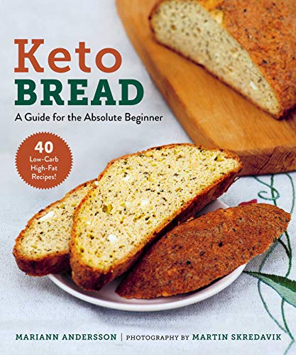 Book cover featuring sliced keto bread on a plate and wooden board.