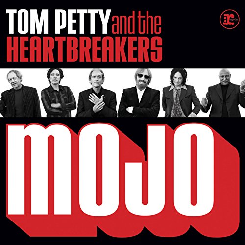 Tom Petty and the Heartbreakers’ “Mojo” album cover with band photo.