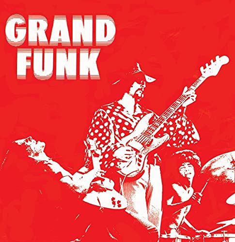 Red album cover for Grand Funk Railroad featuring musicians playing instruments.