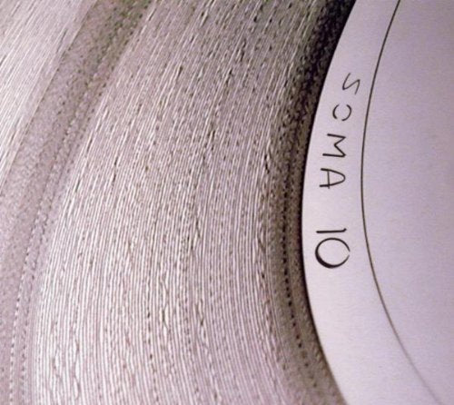 Close-up of a CD case with “SOMA 10” text on a white band.