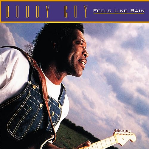 Buddy Guy album cover, portrait of a man playing guitar, cloudy sky.
