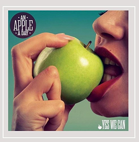 CD cover: close-up of a bitten green apple held to lips.