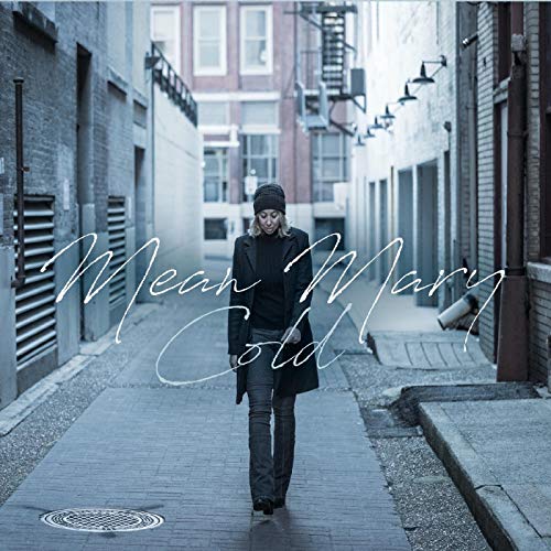 Album cover: woman in black walking down a narrow, urban alley.