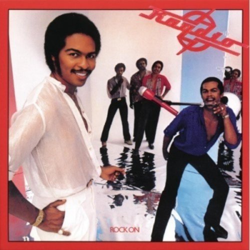 Raydio album cover, “Rock On”, featuring a band portrait in stylish clothing.
