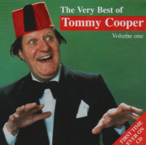 CD cover featuring Tommy Cooper inCS wearing a red fez and black tuxedo.