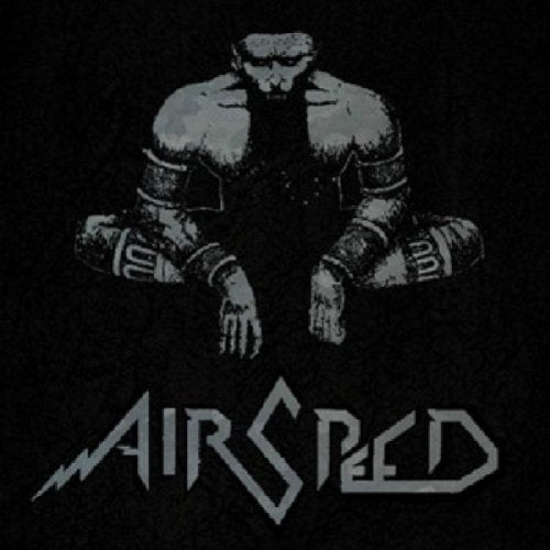 Black and white vinyl record cover with a seated, armored figure.