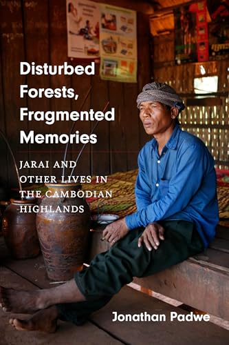 Book cover featuring a Cambodian man seated outdoors, titled "Disturbed Forests.