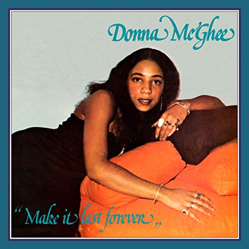 CD cover featuring Donna McGhee leaning on orange pillows with album title text.