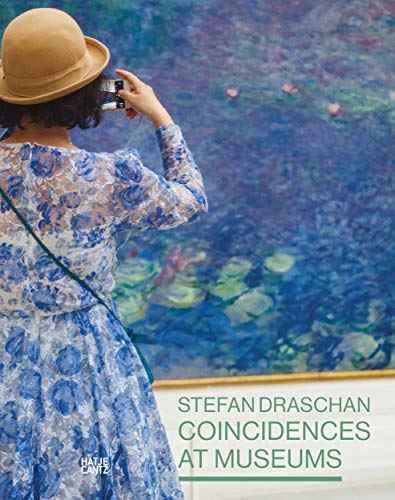 Woman in hat photographing a Monet-style water lily painting.