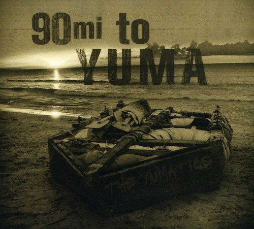 CD cover: beach scene with a guitar in a wooden crate.