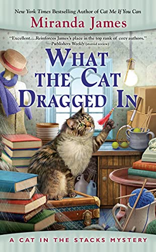 What the Cat Dragged In: A Cat In the Stacks Mystery #14