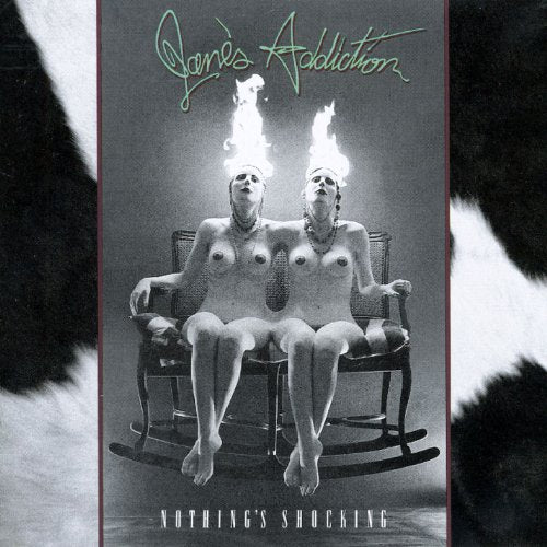 Jane’s Addiction album cover: two figures with flaming heads on a rocking chair.